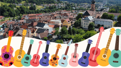 Fotomontage mit Stadtpanorama von Bad Brückenau sowie einer Sammlung an grafisch illustrierten Ukulelen