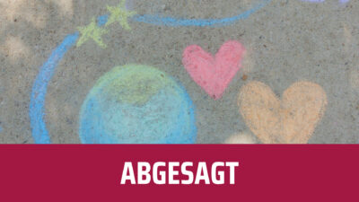 Bilder, die mit Straßenkreide auf Teer gemalt wurden